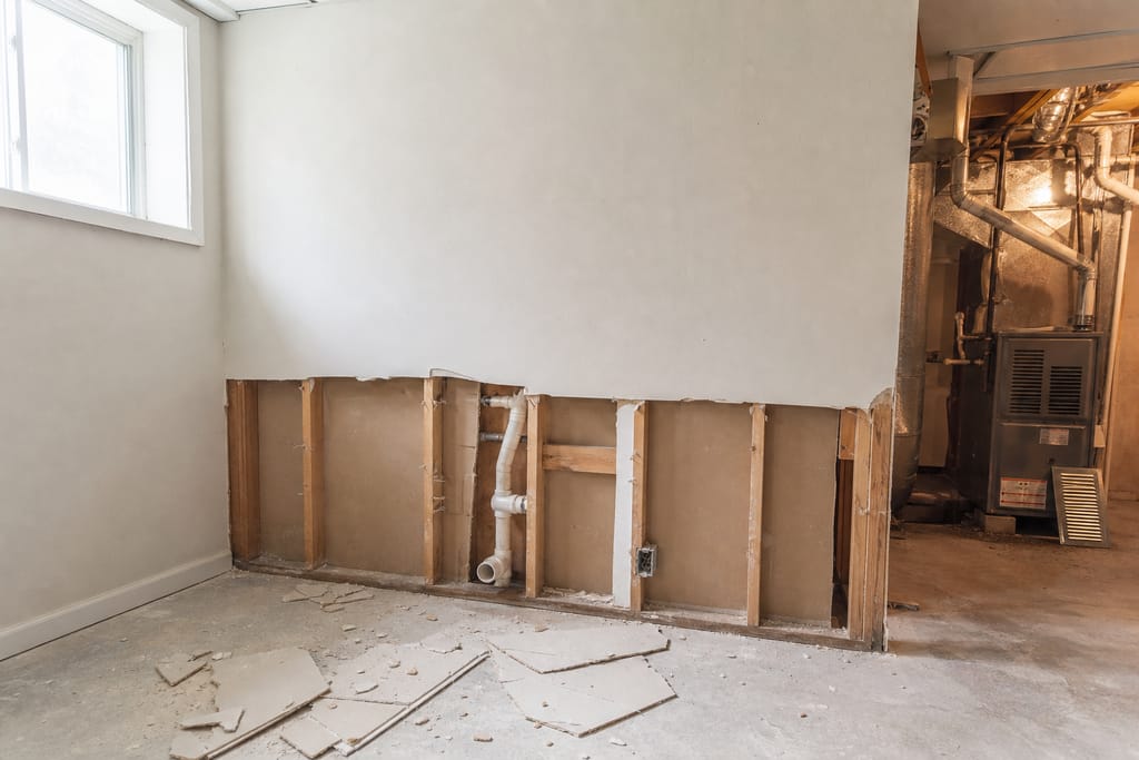 Removing damaged drywall photo
